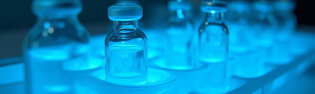 Close-up view of temperature-sensitive medical vials in protective packaging